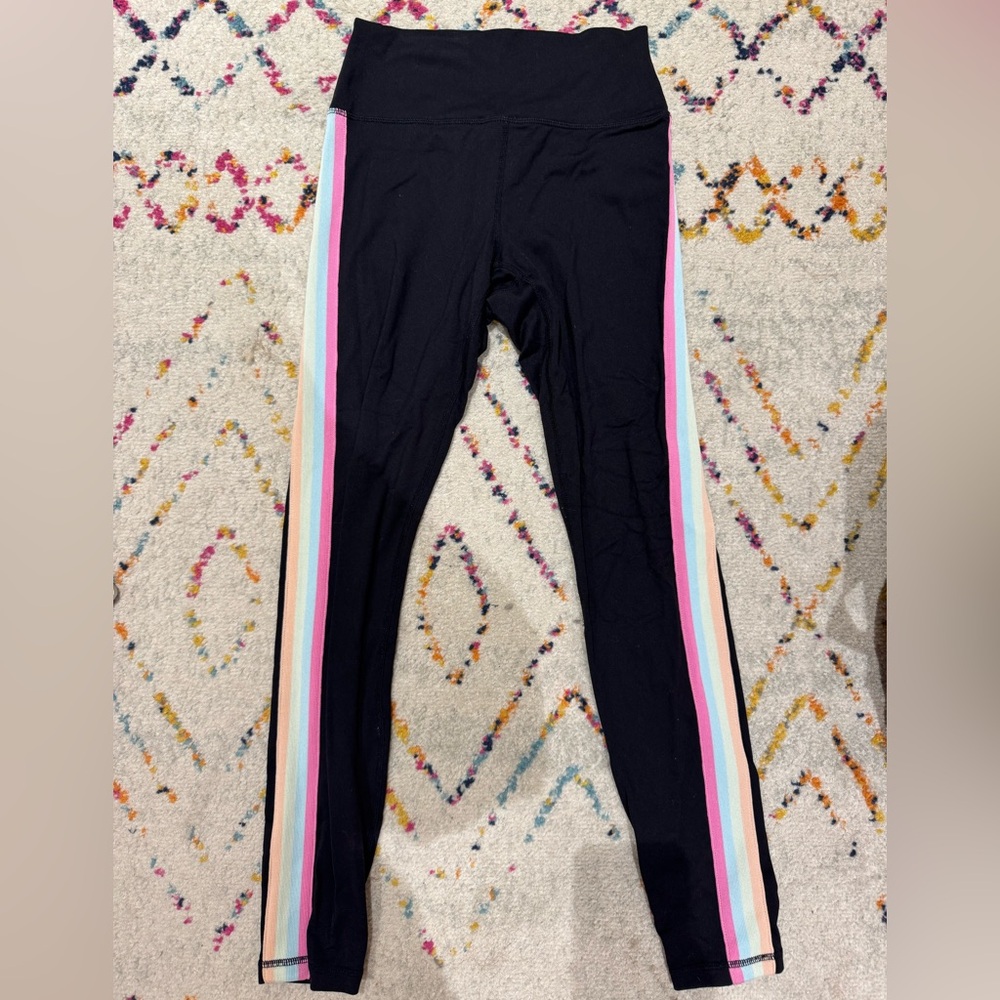 Size small black leggings with rainbow stripe down the sides